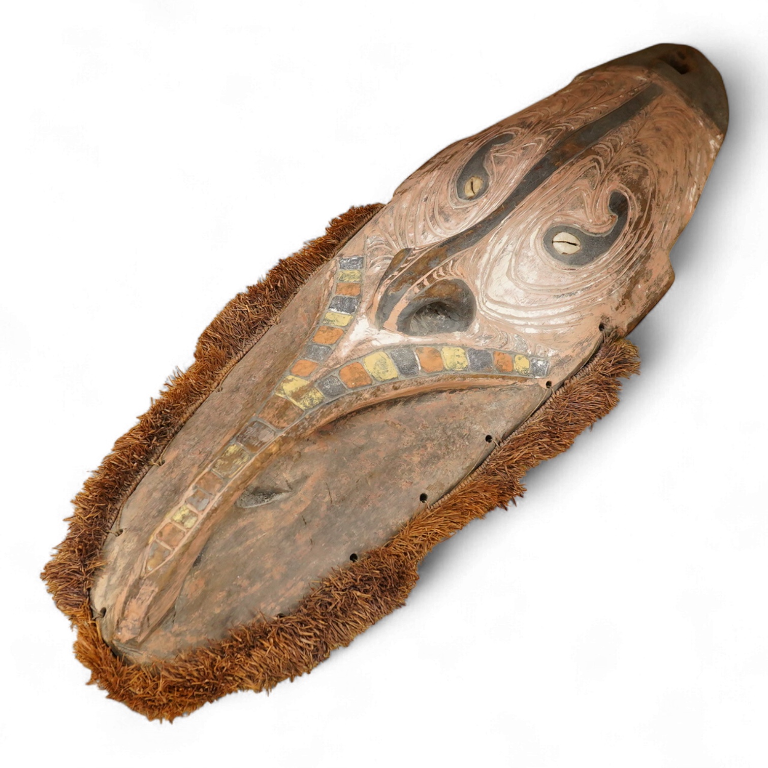 Oceanic tribal art interest; a Papua New Guinea carved and painted mask, 70cm